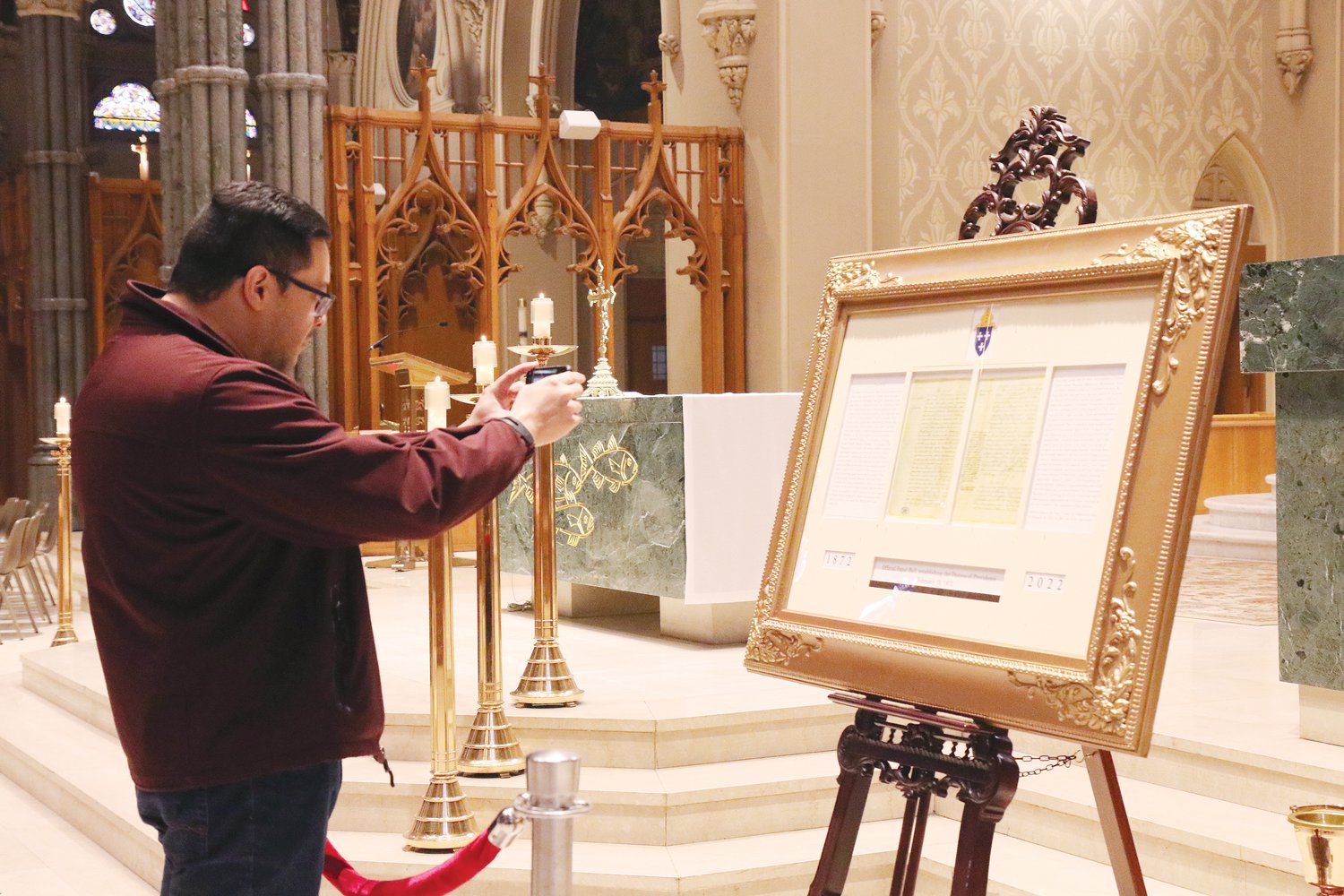 On Sunday, Dec. 5, Bishop Thomas J. Tobin blessed an authentic copy of the papal bull issued by the Holy See on February 16, 1872. Many gathered to get a close up look at the Vatican document signed by Pope Pius IX which created the Diocese of Providence.